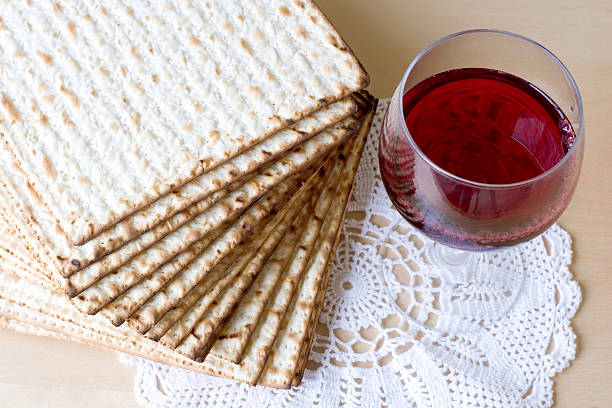 Celebration of Passover Matzoh and red sweet wine matzo stock pictures, royalty-free photos & images