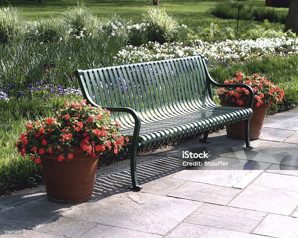 Garden Bench Metal garden bench in park. Dallas - Texas Stock Photo