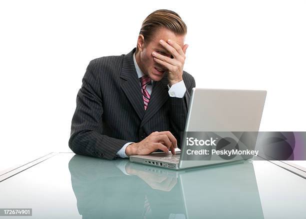 I Sent It Bad News Businessman Shielding Eyes At Desk Stock Photo - Download Image Now