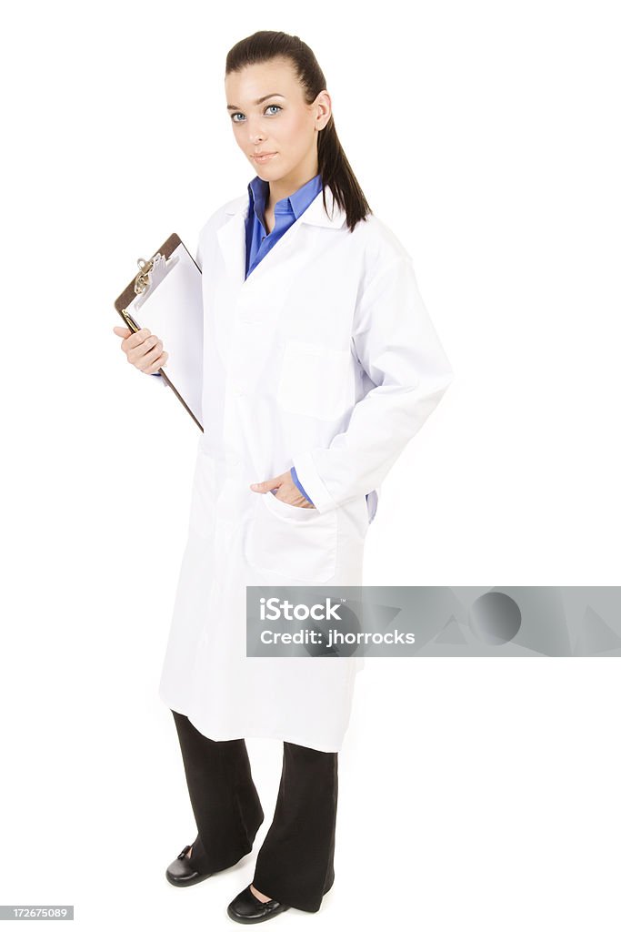 Pharmacist with Clipboard Photo of a young pharmacist holding a clipboard under one arm. Pharmacist Stock Photo