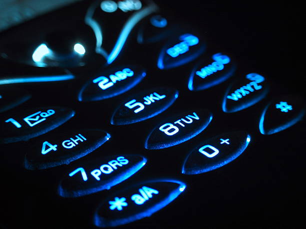 a cell phone keypad (night) stock photo