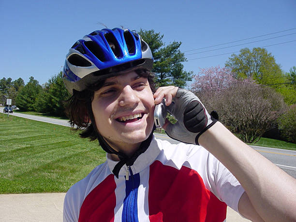 istock Bicyclist on Cell Phone 172675597