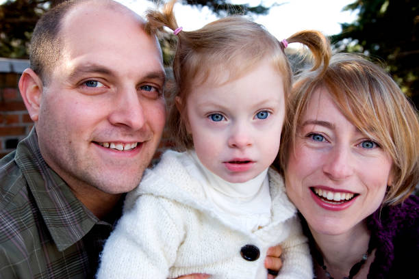 istock Mom, Dad & Daughter 172675644