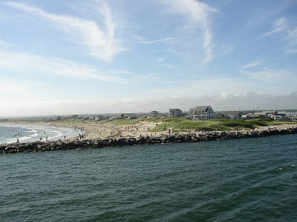 The coastline covered in beach houses and a beach filled with people. View my other Coastal New England photos: