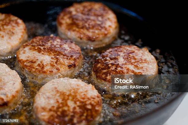 Sizzling Sausages Stock Photo - Download Image Now - Breakfast, Bubble, Cast Iron