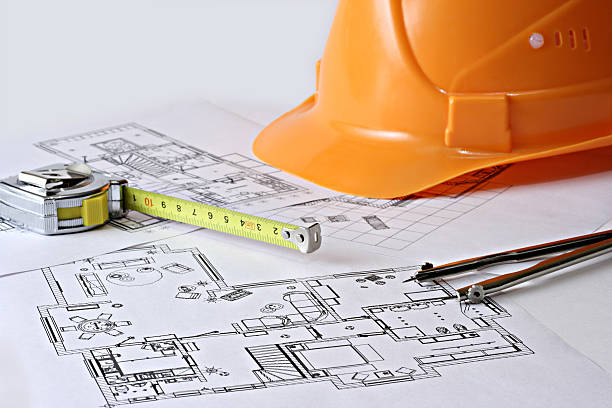istock Building concept with architectural drawings and a hard hat 172676273