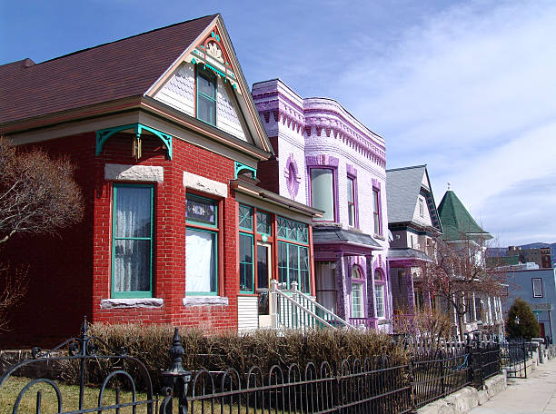 Old victorian homes line in a street stock photo