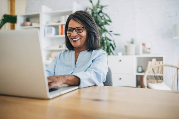 istock Mature woman using laptop 1726765013
