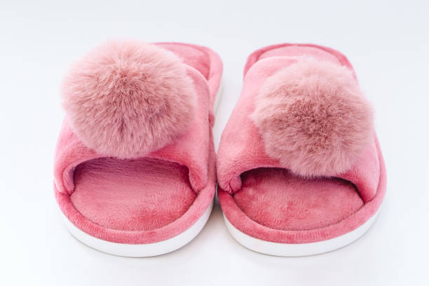 istock Pink home fluffy slippers on white background 1726765028