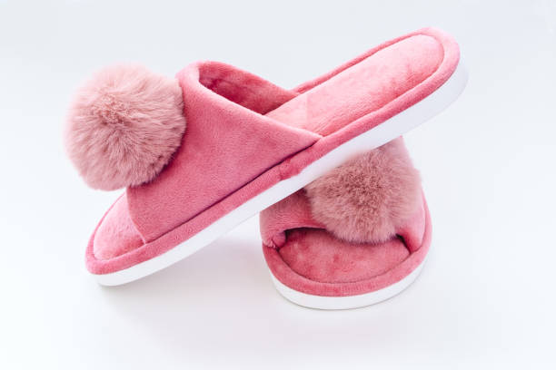 istock Cute home pink fluffy slippers on white background 1726765032
