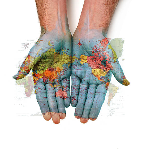 offrendo il mondo - map cartography travel human hand foto e immagini stock