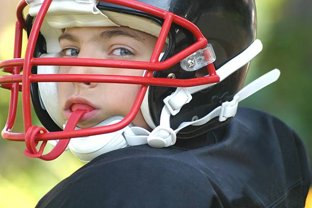 istock Boy In Football Uniform and Helmet 172678875