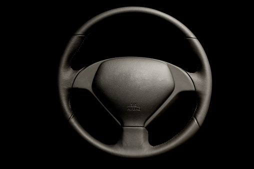 Steering Wheel on black with vector path.