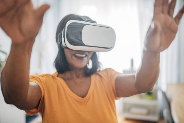 istock Woman wearing virtual reality headset 1726789976