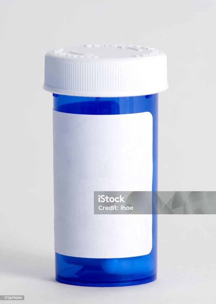 Médecine Récipient en plastique bleu - Photo de Comprimés en flacon libre de droits