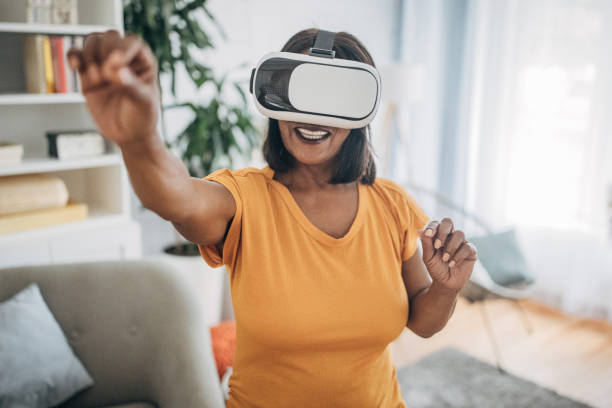 istock Woman wearing virtual reality headset 1726790535