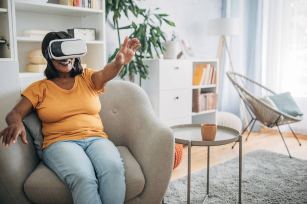istock Woman wearing virtual reality headset 1726791622