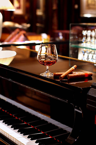 Cognac & Cigars on Piano stock photo