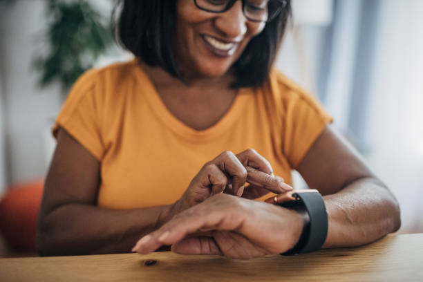 istock Mature woman checking smart watch 1726799997