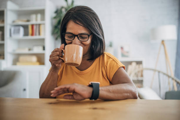 istock Mature woman checking smart watch 1726800604