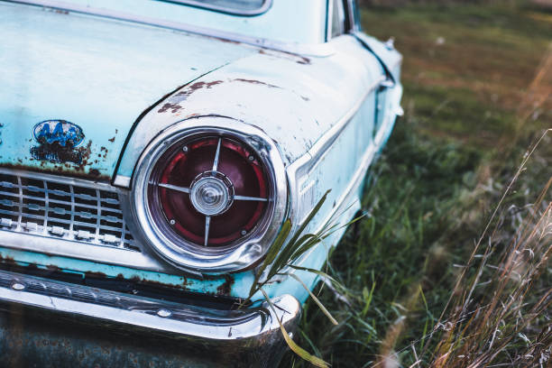 istock old rusted cars in the field 1726819141