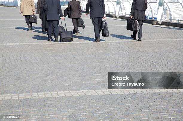 Group Of Six Businessmen Walking Stock Photo - Download Image Now - Adult, Airport, Briefcase