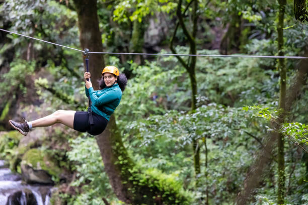 istock Young woman jumping off the zipline 1726847461