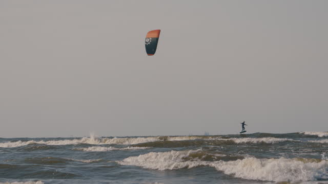 Kiteboard on the windy Sea
