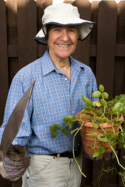 istock Senior Gardener with Floppy Hat 172685194