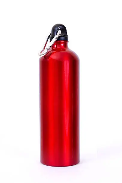 "A red waterbottle of the type used by climbers, walkers and campers. A karabiner is attached to the top."