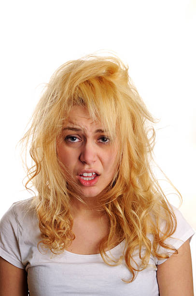 ベッドのヘッド - humor human face women grimacing ストックフォトと画像