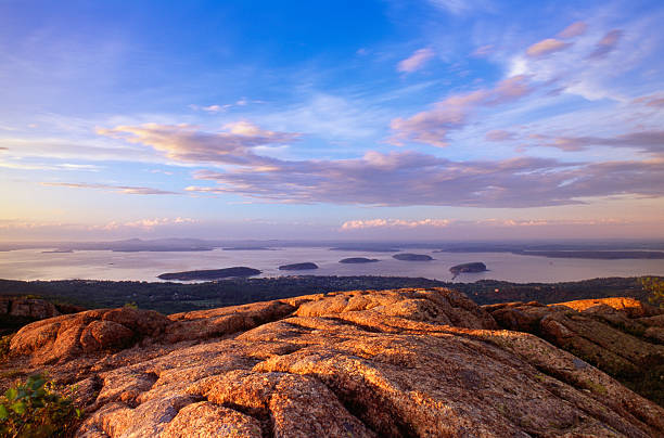 Cadillac Mountain with fog and wispy cloud