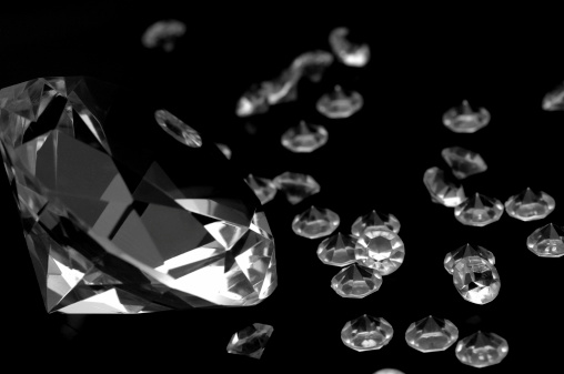 Big and small diamonds, isolated on pure black