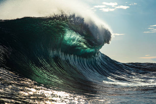 istock Powerful large ocean wave standing up in bright morning light 1726868588