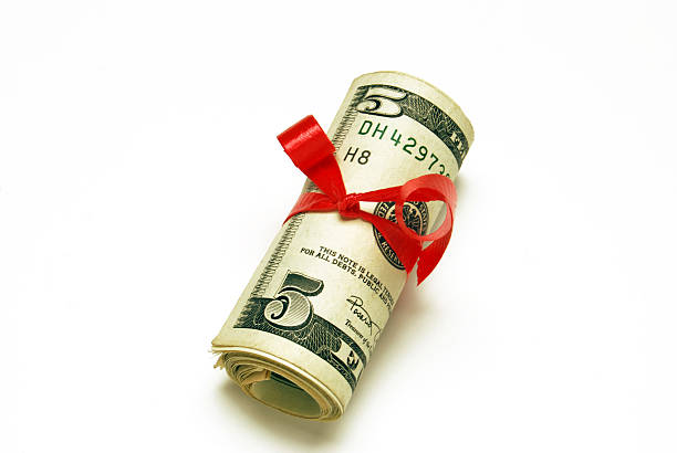 Dollars Financial Gift.More five dollar bill stock pictures, royalty-free photos & images