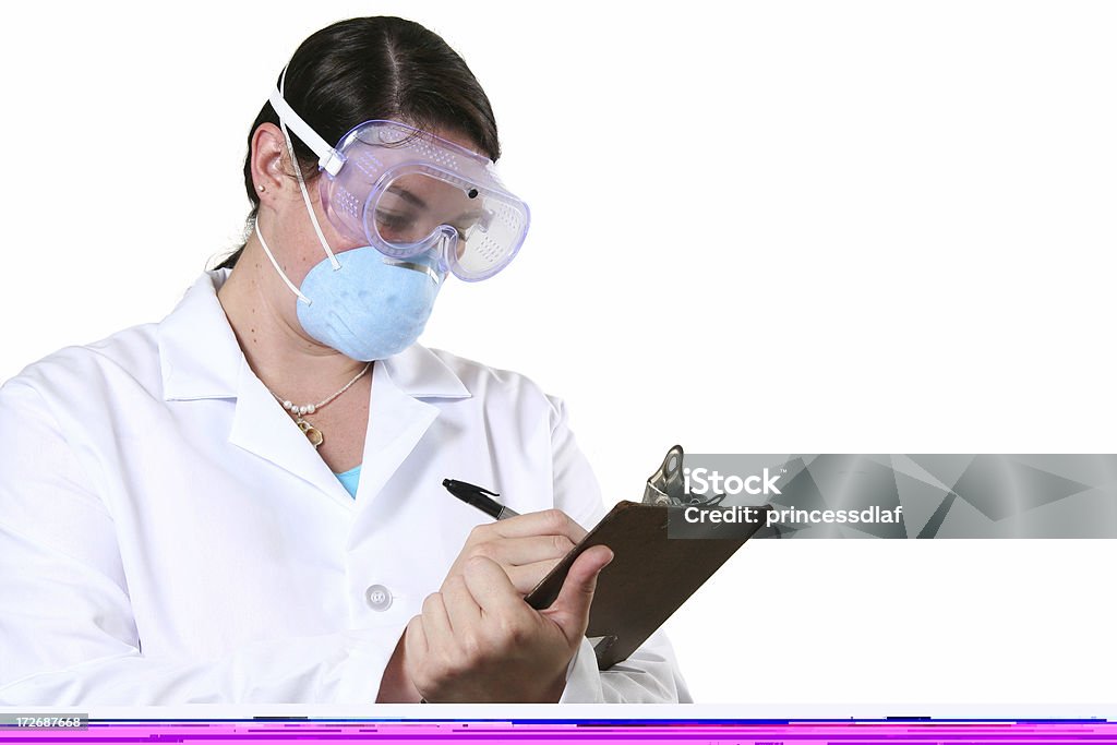 Woman and laptop Happy senior woman working on a laptop in her rocking chair Females Stock Photo