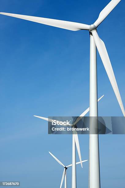 Three Mighty Windmills In A Row Stock Photo - Download Image Now - Wind Turbine, Close-up, Front View