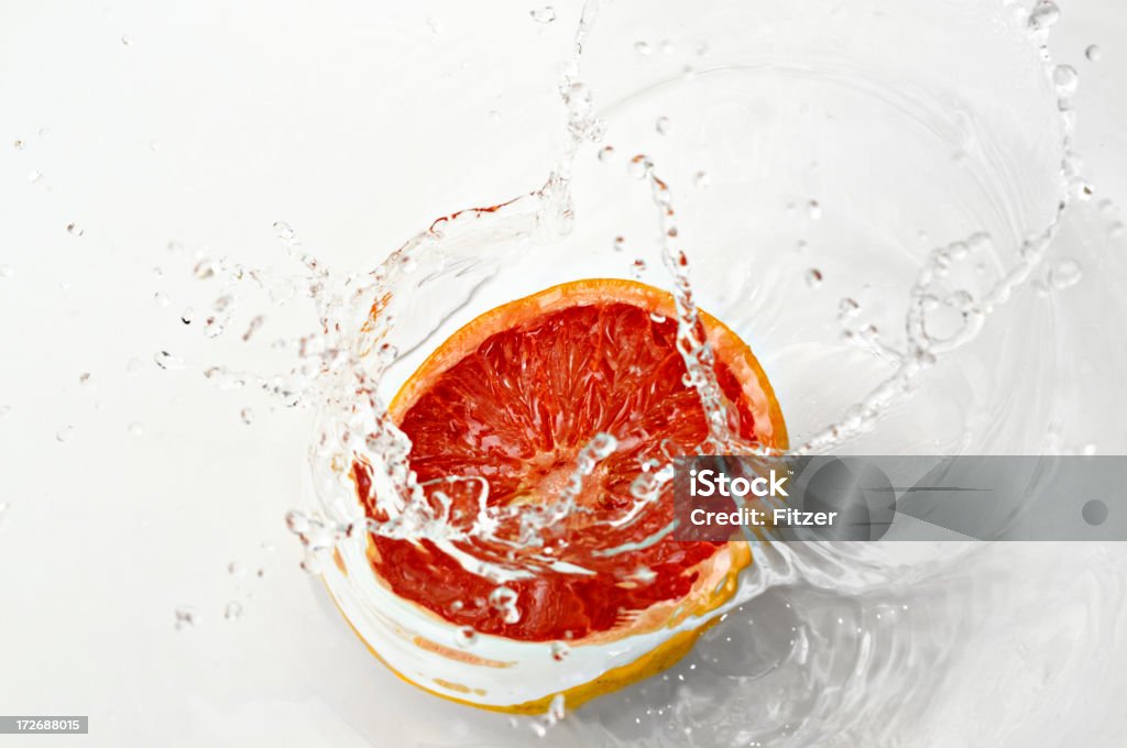 splash uva - Foto stock royalty-free di Pompelmo