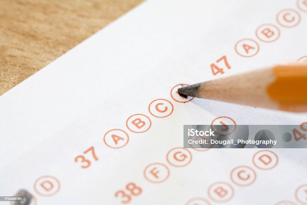 Test Answer Sheet Electronically scored form used for surveys and tests.  Could be used to represent standardized school exams. Report Card Stock Photo