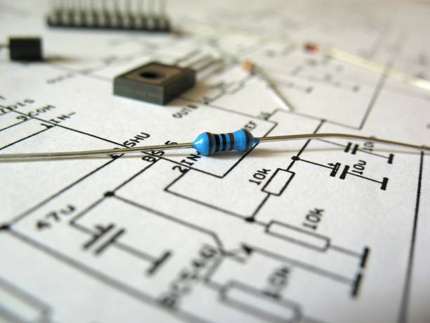 istock Electronic blueprints with scattered pieces of wiring 172689872