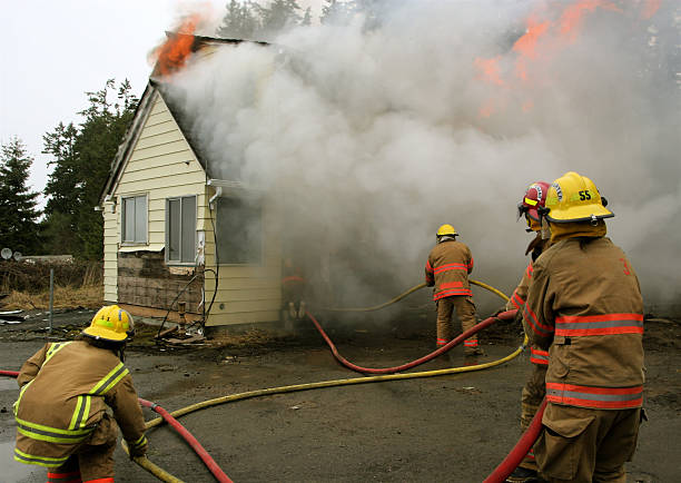 istock Firemen Going Into Burning House For Rescue 172689911