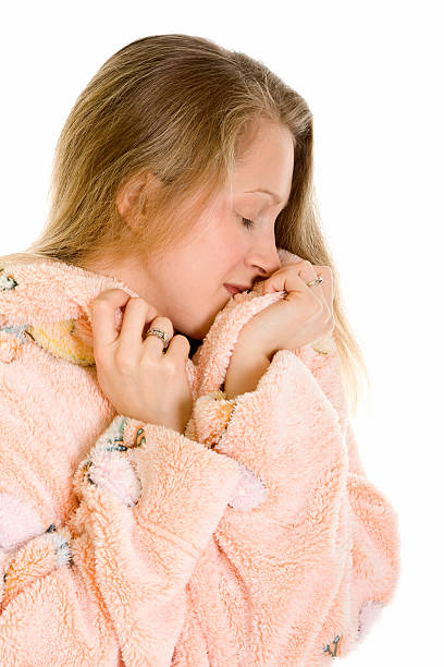 istock Beautiful woman in a bathrobe islated on white 172690013