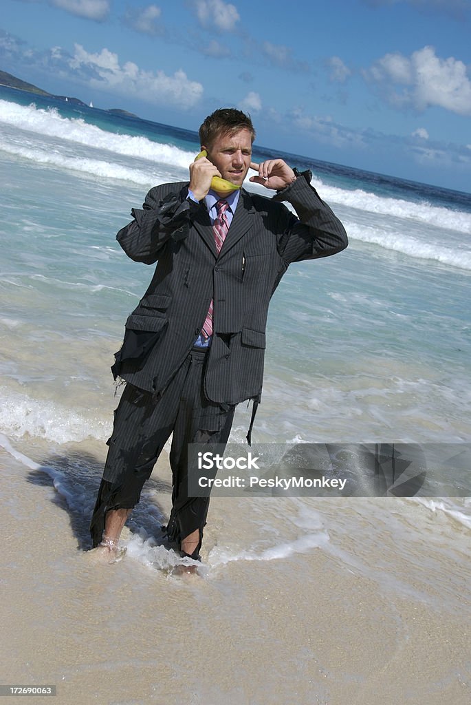 Castaway Geschäftsmann am Telefon spricht Banana - Lizenzfrei Abgeschiedenheit Stock-Foto