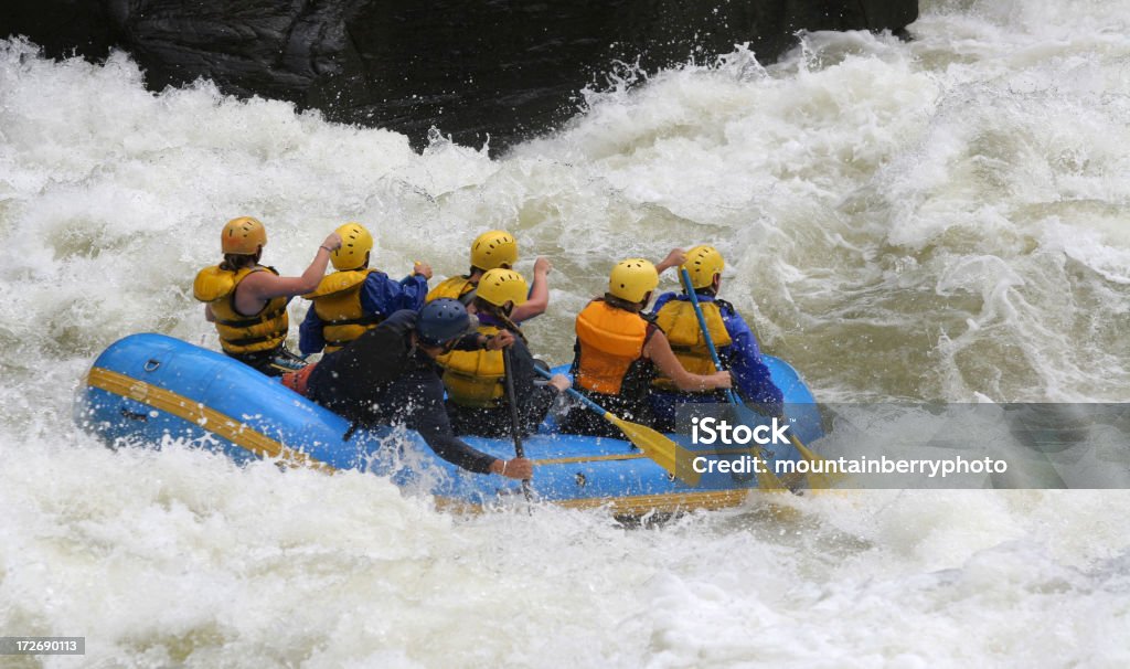 Whitewater Boating Whitewater lovers got their hands full. Adventure Stock Photo