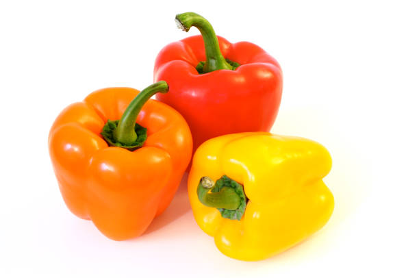 Orange, Red & Yellow Peppers stock photo