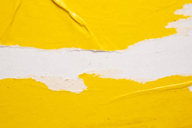 istock Old grunge ripped torn yellow paper poster surface texture background 1726904001