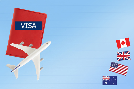 Visa and passport with airplane and flag for travel and ecucation with copy space.