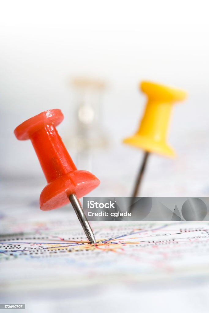 Navigation Pinpointing a location on a map. Shallow DOF on red pushpin. Accuracy Stock Photo