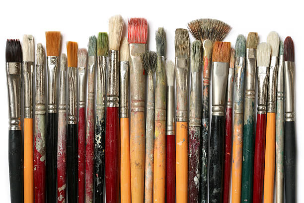 istock Lots of old paintbrushes in a row  - XL 172691246