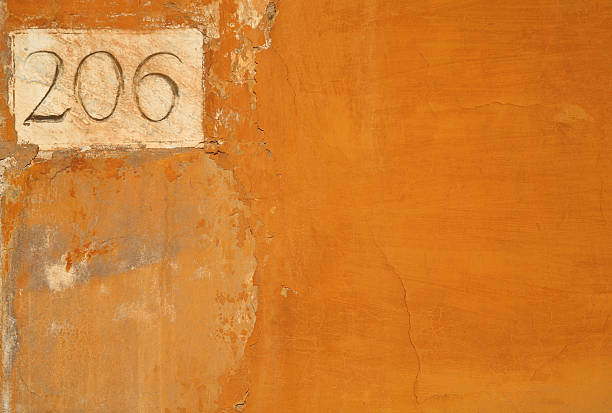 istock Orange Roman grunge wall texture  - XL 172692099
